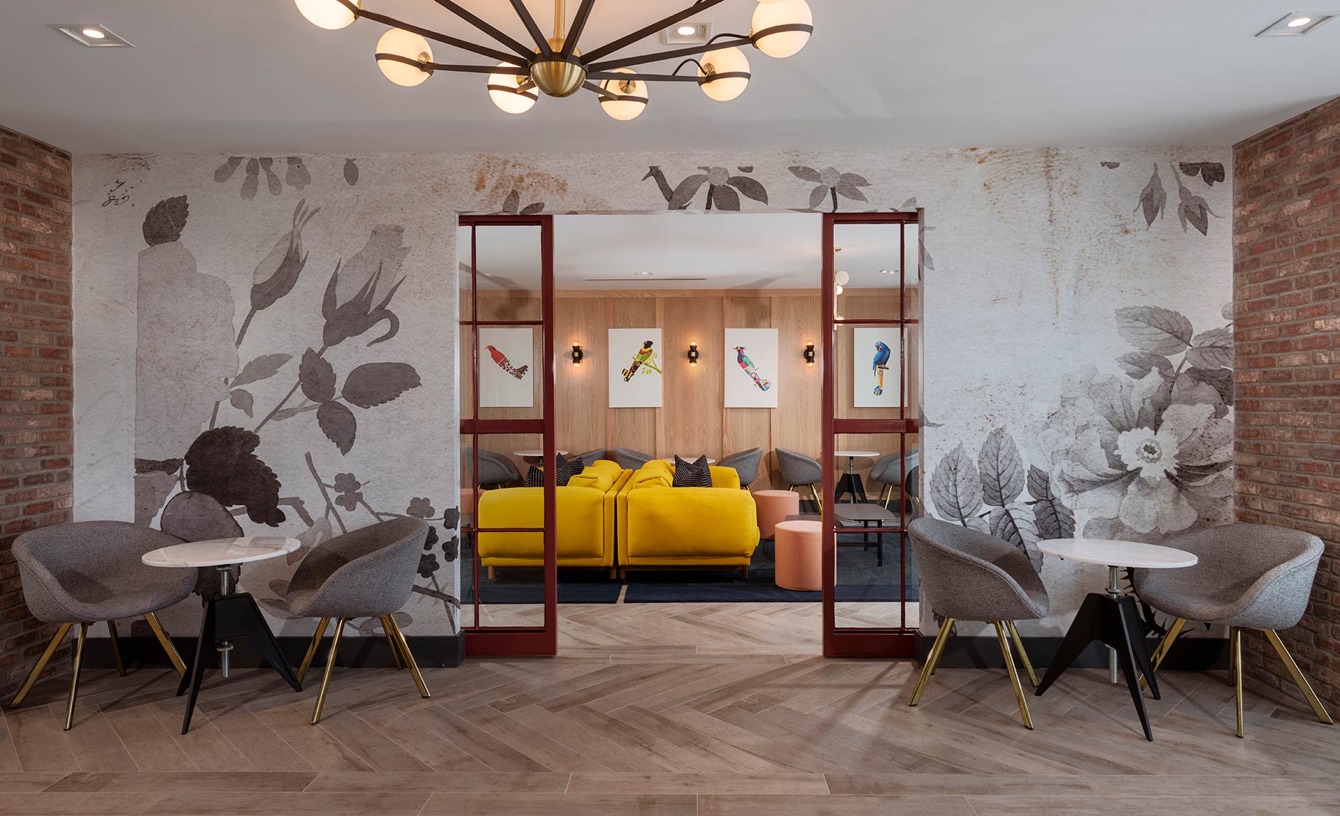 dining tables in front of entrance to lounge area