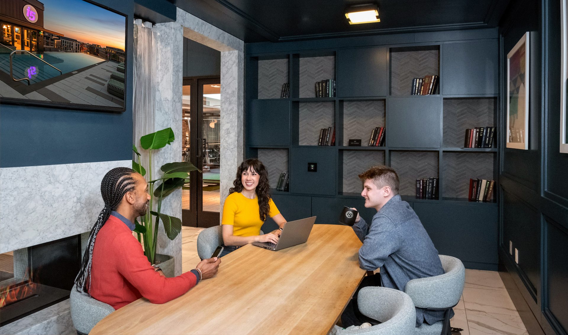 library with long table near fireplace