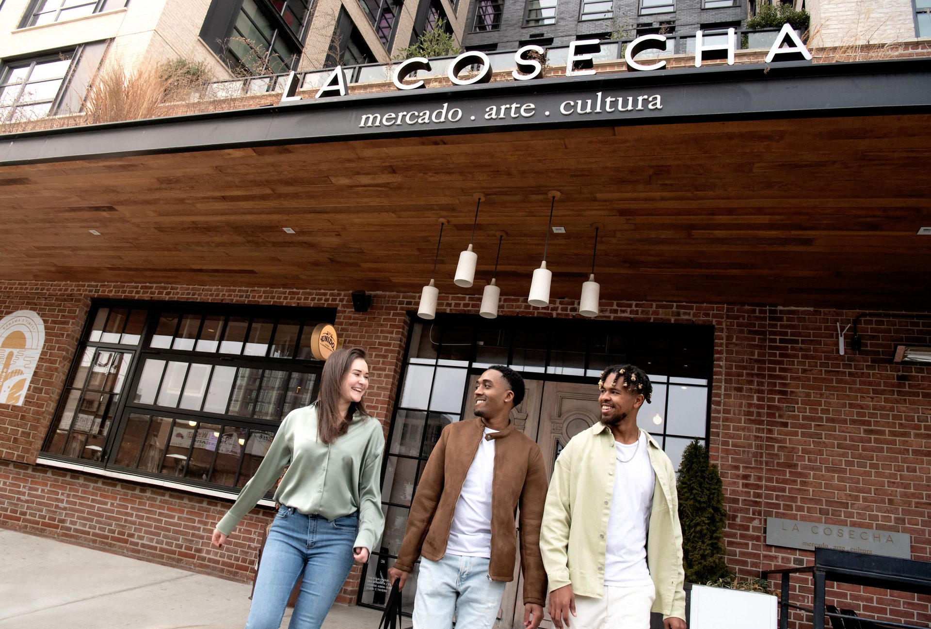 market sign reflected in puddle